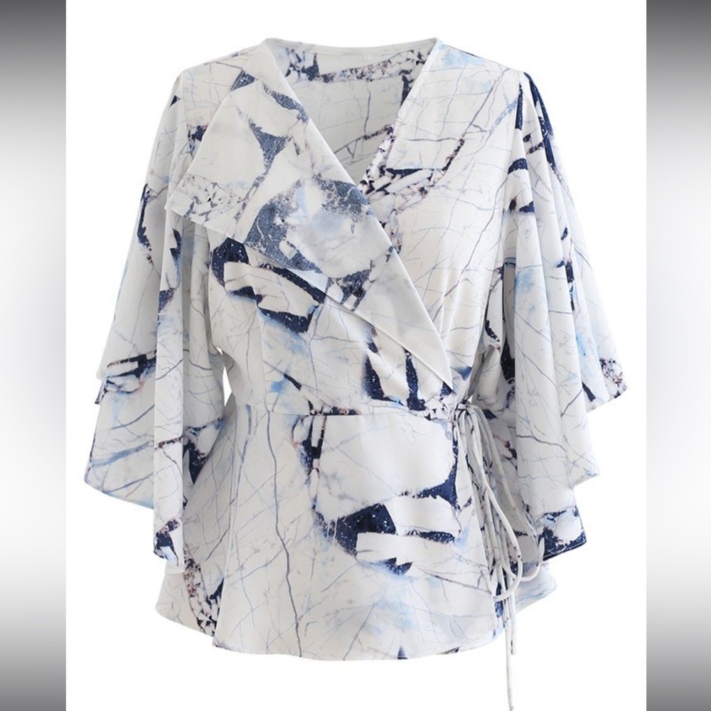 BUTTERFLY FLARE SLEEVE PRINTED WRAP TOP IN BLUE